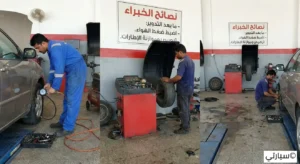فني يقوم بفحص ضغط الهواء في الإطارات بعد عملية التدوير