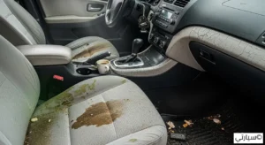 مقاعد سيارة قماشية متسخة جداً وعليها بقع نتيجة إهمال التنظيف